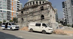 A security guard was found dead at a mosque construction site.