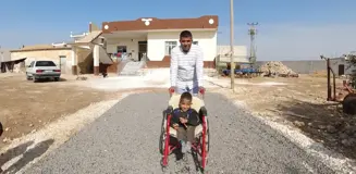 Harran'da engelli çocuğun yol talebi yerine getirildi