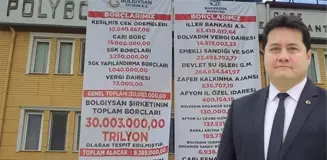 AK Parti'den MHP'ye geçen ilçede yeni başkan borçları belediye binasına astı