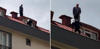 Çatı tadilatı yapan işçi beline ip bağlayarak güvenlik önlemi aldı