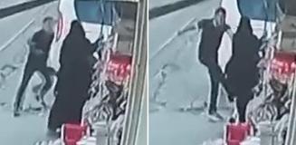 Sokak ortasında eşine tekme ve yumrukla saldırdı