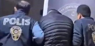 İzmir'de 50 yıl hapis cezasıyla aranan şüpheli gardıropta yakalandı
