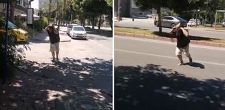 Yolda yürürken kargaların saldırısına uğradı, ne yapsa kurtulamadı Yolda yürürken kargaların saldırısına uğradı, ne yapsa kurtulamadı