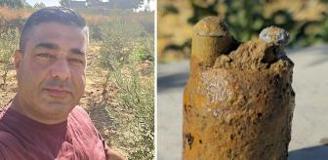 Zeytin bahçesini sularken bulduğu cisim asırlık top mermisi çıktı