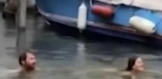 Yasağa rağmen suya atlayan turist çift, şehirden kovuldu