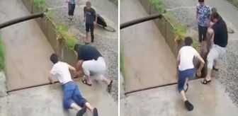 Sel sularına kapılan 12 yaşındaki çocuğu vatandaşlar son anda kurtardı