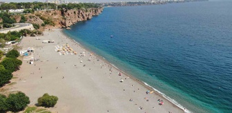 Antalya'da eylül sonunda 28 derecede sahiller yazdan kalma görüntülere sahne oldu