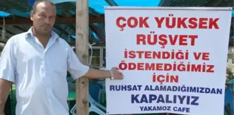 Ruhsatsız Diye Kapatılan İşyerine Rüşvet İddiasıyla Pankart Astı