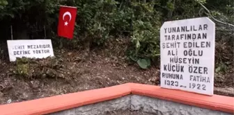 Definecilerin Talan Ettiği Şehit Mezarına Uyarı Yazısı