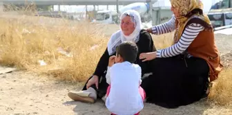 Peşmergenin elindeki genç ailesine kavuşmayı bekliyor