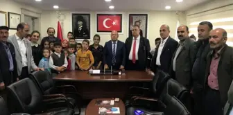 İş adamı Karahanlı'dan şehit çocuklarına kırtasiye yardımı