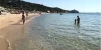 Sardinya Adası'ndan iki kilo kum kaçırmaya çalışan turiste bin euro ceza kesildi