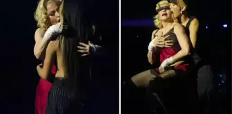 Madonna konser sırasında kadın dansçısını dudağından öptü