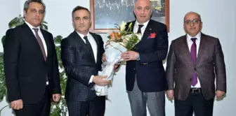 Erzurum Vergi Dairesi Başkanı Selahattin Atabek, Erzurum Ticaret ve Sanayi Odası'nı ziyaret etti