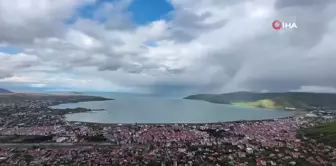 Yağmur ve dolu altında saatlerce 'gökkuşağı'nı beklediler