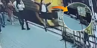 A female tourist experienced horror! While posing for a photo, she came into contact with a train and fell onto the tracks.