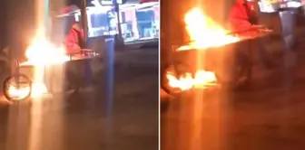 The alcoholic street vendor set the fruit stand on fire.