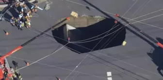 In Japan, the road collapsed, and a truck fell into a giant pit.