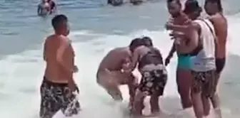 The man caught satisfying himself among the waves was brutally beaten.