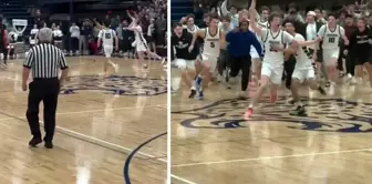 It's not an NBA game, it's a school tournament! The gym erupted with a three-pointer made in the last second.