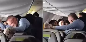 The male passenger with psychological issues attacked the female passenger sitting in front of him.