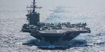 A U.S. Navy aircraft carrier collided with a cargo ship in the Red Sea.