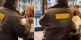 The security guard slapped the woman who did not want to leave the restaurant.