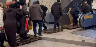 The metrobus underpass was flooded, and citizens had to walk through the water.