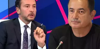 Ersin Düzen gives a historic adjustment to Acun Ilıcalı live on air.