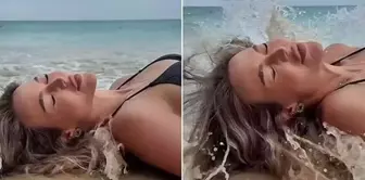 The model's beach shoot turned into a disaster with a wave surprise.