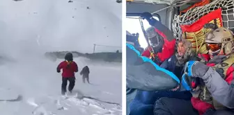 The man trapped in the snow was rescued by a military helicopter.