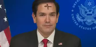 The U.S. Secretary of State appeared on television with a cross mark on his forehead.