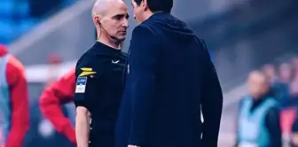 The coach who confronted the referee has been banned from football.