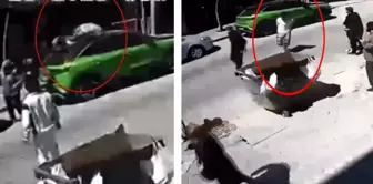 During the earthquake, he jumped from the balcony and landed on the car.