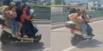 سفر خطير بالدراجة النارية! حتى السيارة لا يمكن أن تحمل هذا العدد من الأشخاص.