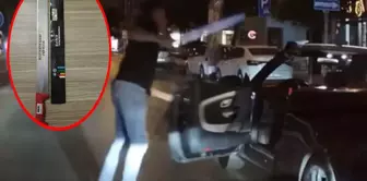 The driver who approached the motorcyclist with a switchblade has been arrested.