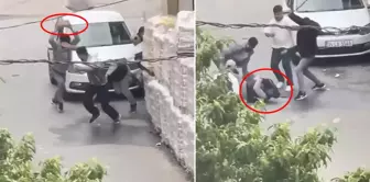 They beat the person they were arguing with using a paving stone and sticks.