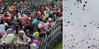 Thousands of balloons were released into the sky for Ali Asaf, who overcame cancer.