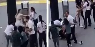 A fight broke out among women in front of the shopping mall, involving kicks and punches.
