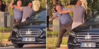 A businessman fought fist to fist with a police officer in traffic.