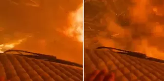 He quickly passed through the flames in his vehicle.