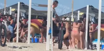 Women fought on the beach over a banned Russian song.