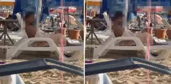 Disgusting behavior! He/she satisfied himself/herself in front of everyone on the beach.