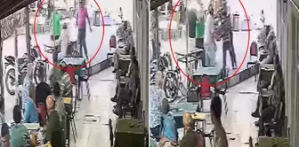 The mother who stormed the coffee shop gives a beating to the man who hit her autistic child.