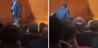 Ali Koç fell to the ground while giving a speech.
