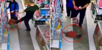 The shocking image: Look at what he did to the tiny child in the middle of the market.