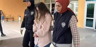 A teacher who is alleged to have bitten a student's arm has been arrested.