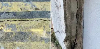 The building's columns have burst, and there is sliding and cracking on the floor.