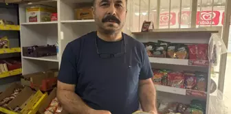 A mysterious benefactor who paid off the grocery debts of 30 people burned the credit ledger.