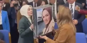 CHP's Dinçer protests Minister Göktaş with a photo and sweater of Saliha Akkaş.